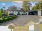 Elegante Immobilie in Hamburg-Sasel: Großzügiges Anwesen mit Teich und luxuriösem Flair - Titelbild