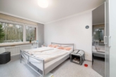 Schlafzimmer - Solide Kapitalanlage: Vermietete 3-Zimmer-Wohnung mit Süd-Balkon in gepflegtem Mehrfamilienhaus